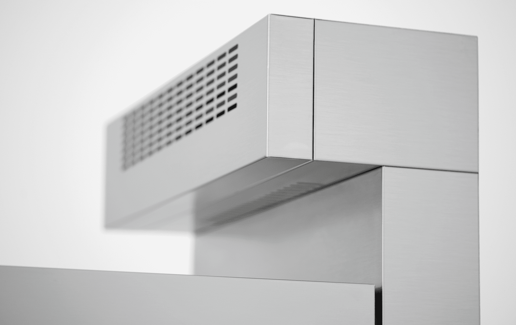 Lave-vaisselle à capot avec unité de condensation de vapeur intégrée